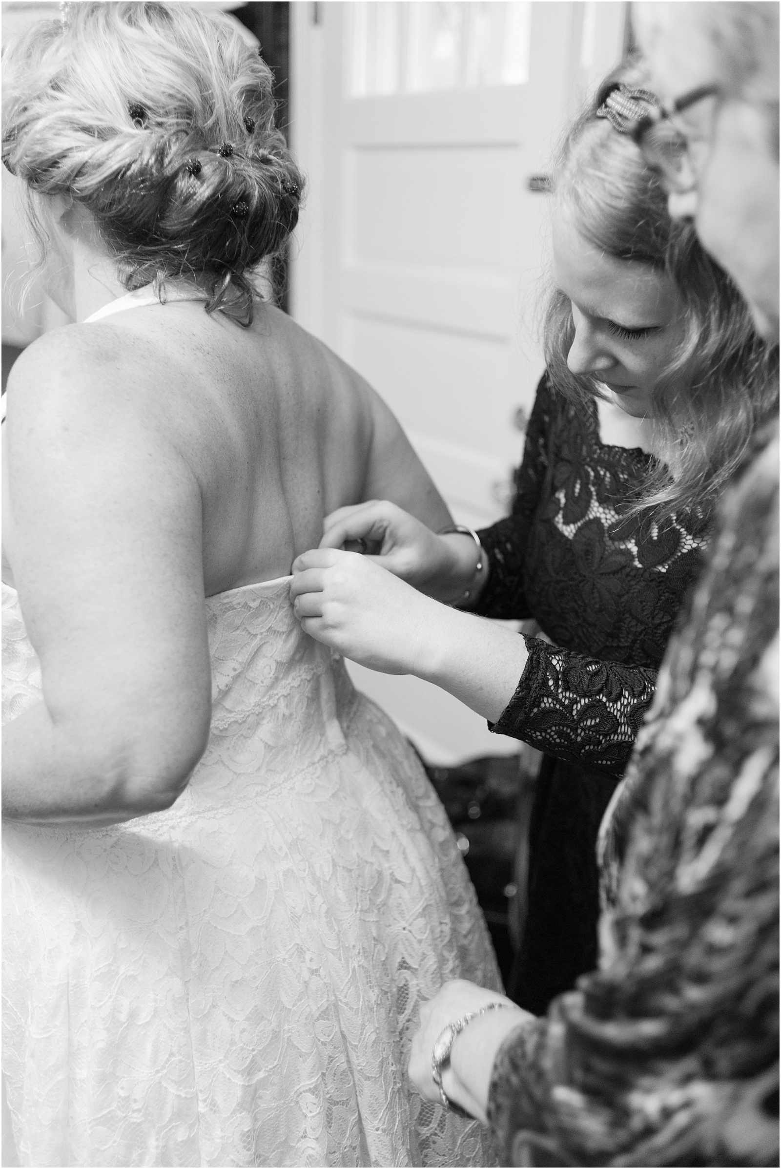Michelle and Sara Photography, Michelle and Sara weddings, michelle robinson photography, burke manor inn, getting ready, bride putting on dress,