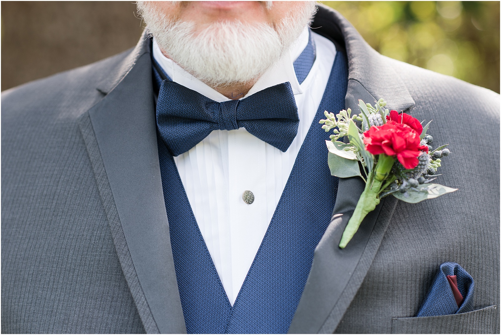 Michelle and Sara Photography, Michelle and Sara weddings, michelle robinson photography, burke manor inn, groom details, boutonniere, floral details for groom, red florals, fall boutonniere, navy and gray suit