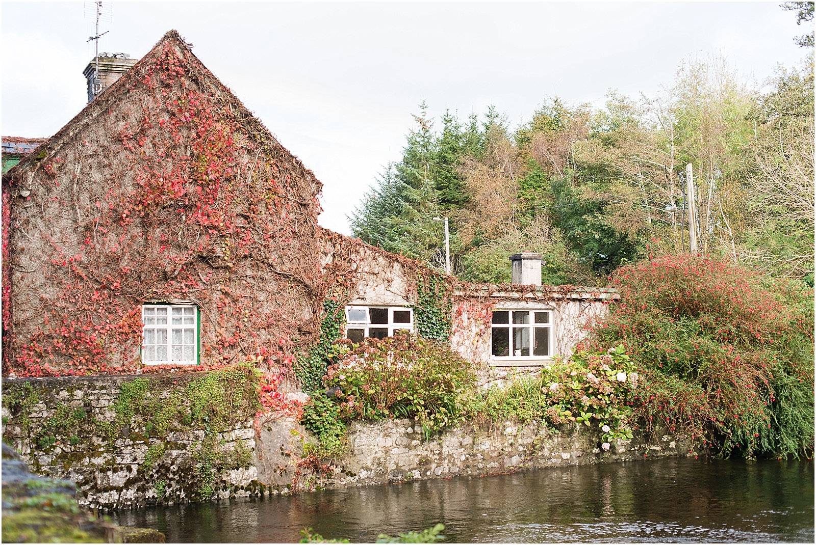 michelle and sara, michelle robinson photography, autum color leaves on house, house by water, Cong Ireland, Ireland, Cong