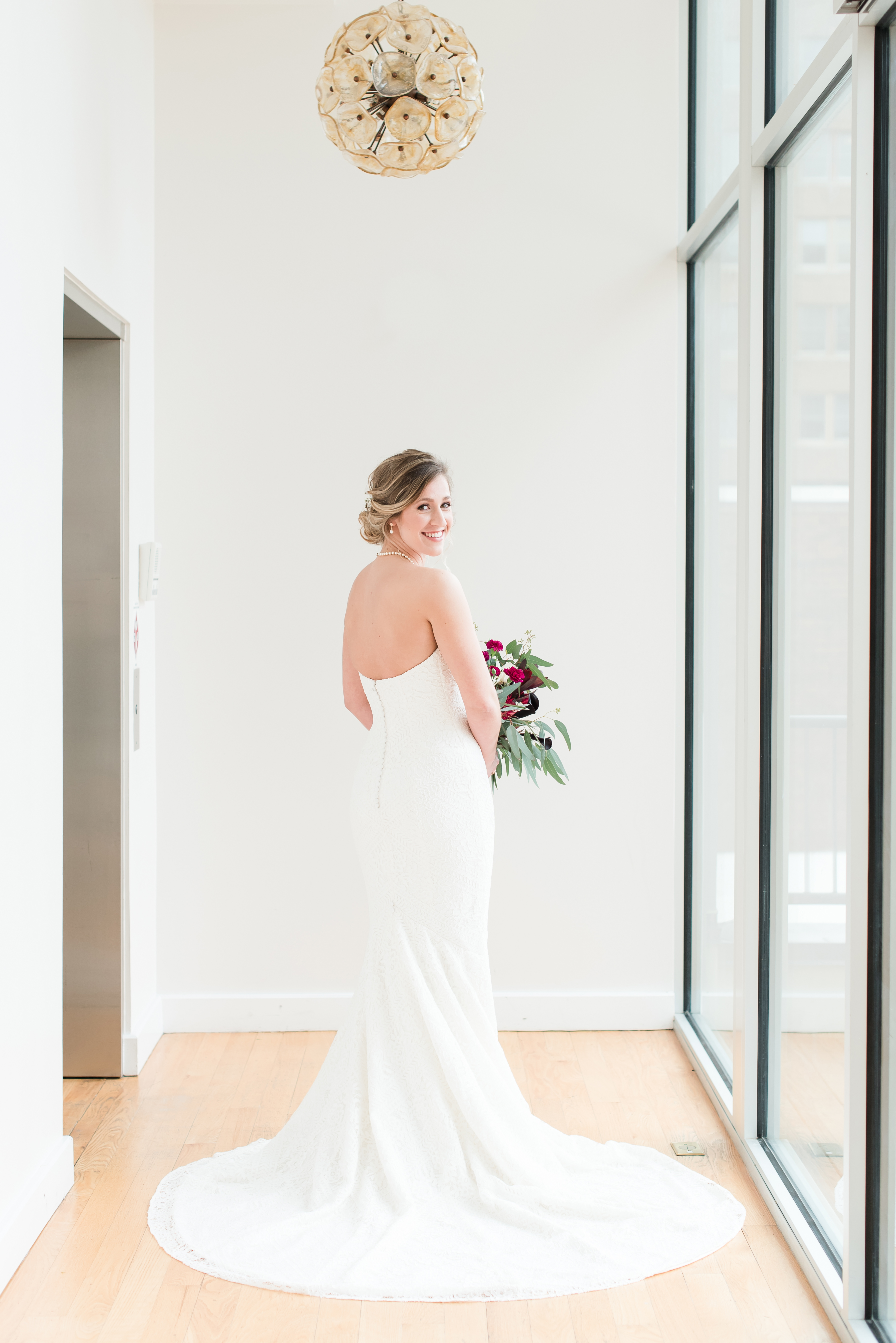 bride looking back at the Glass Box