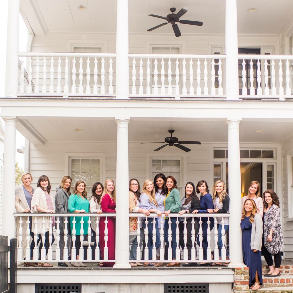 a group of photography ladies at a air bnb in charleston sc