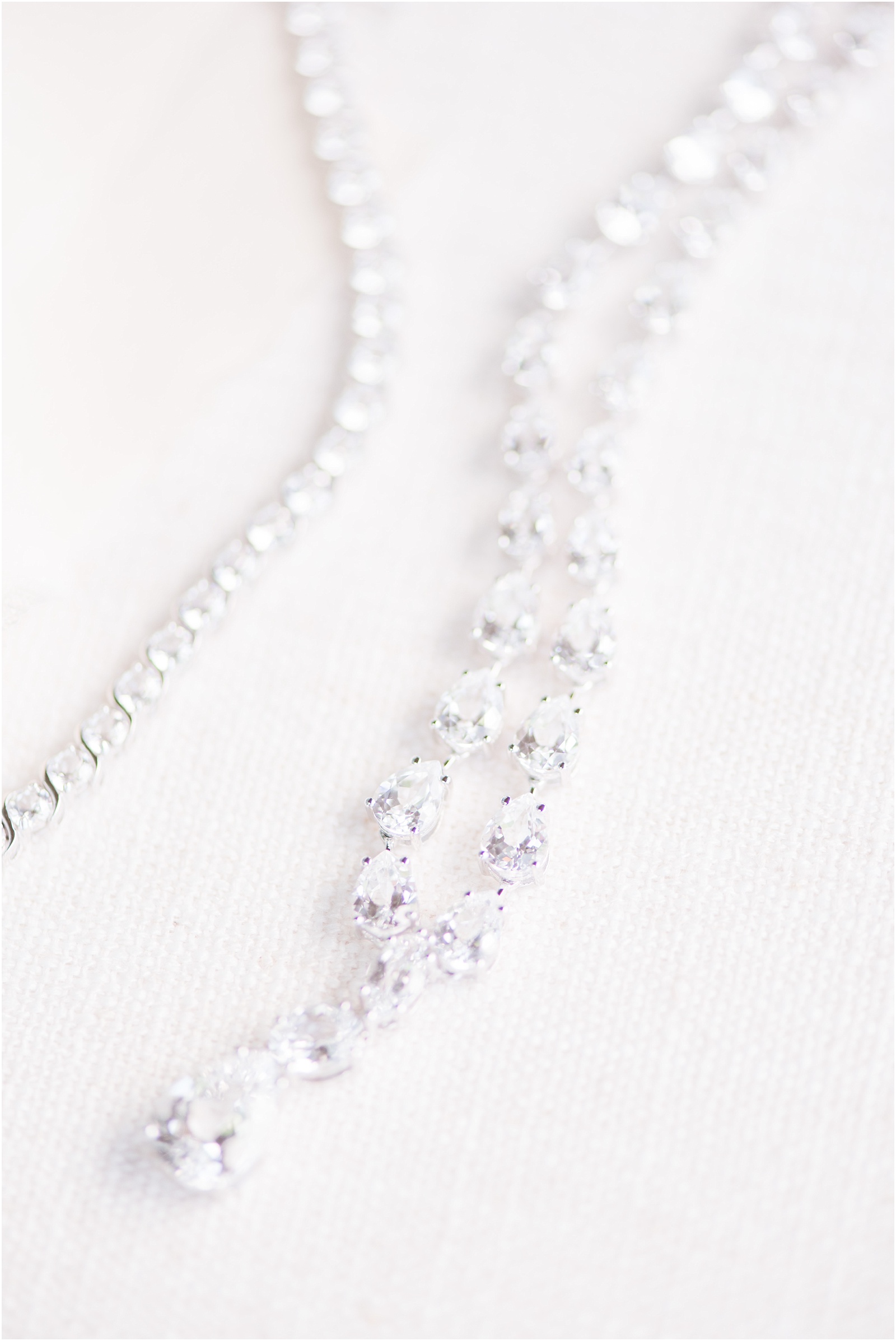 detail of wedding necklace at Starlight Meadow