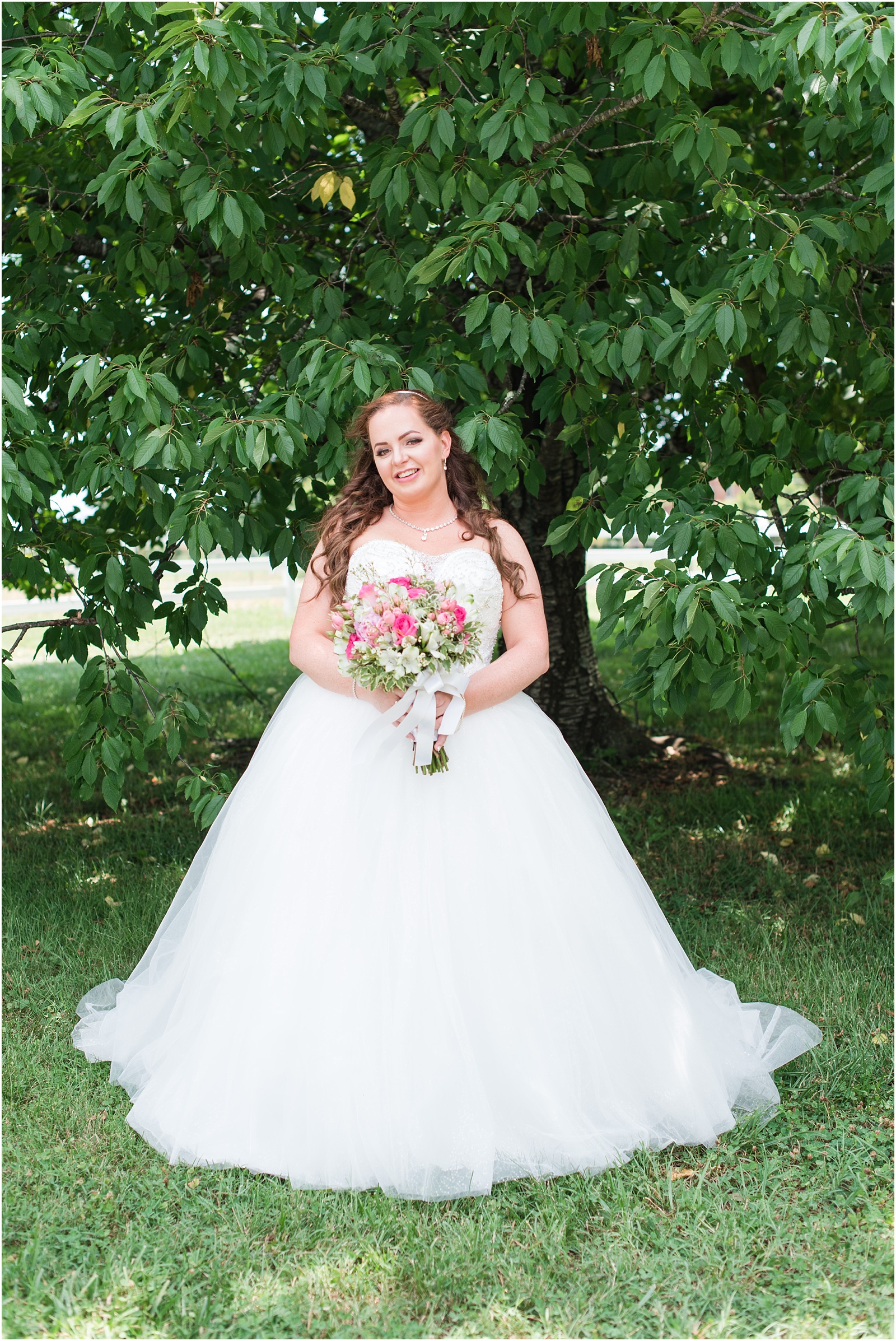 a photograph of the bride holding her wedding bouquet at Starlight Meadow