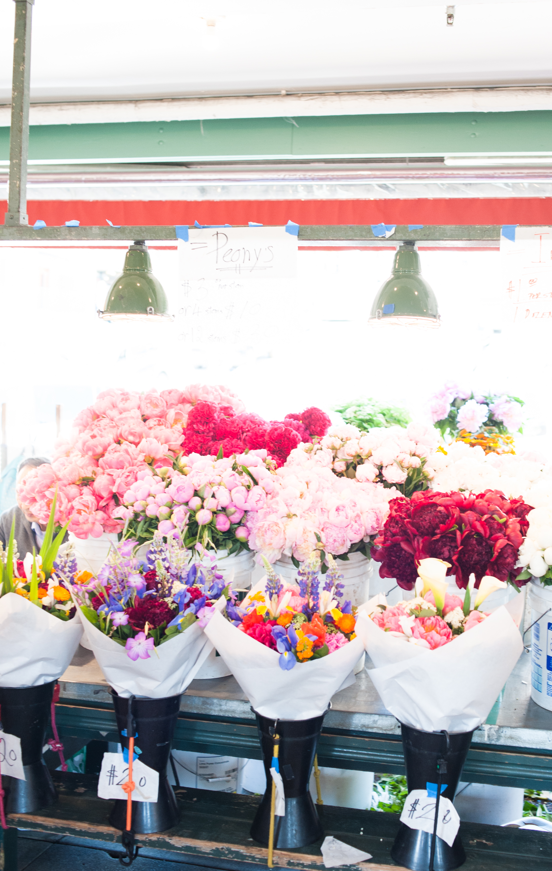peony's stand at the public market place in seattle washington