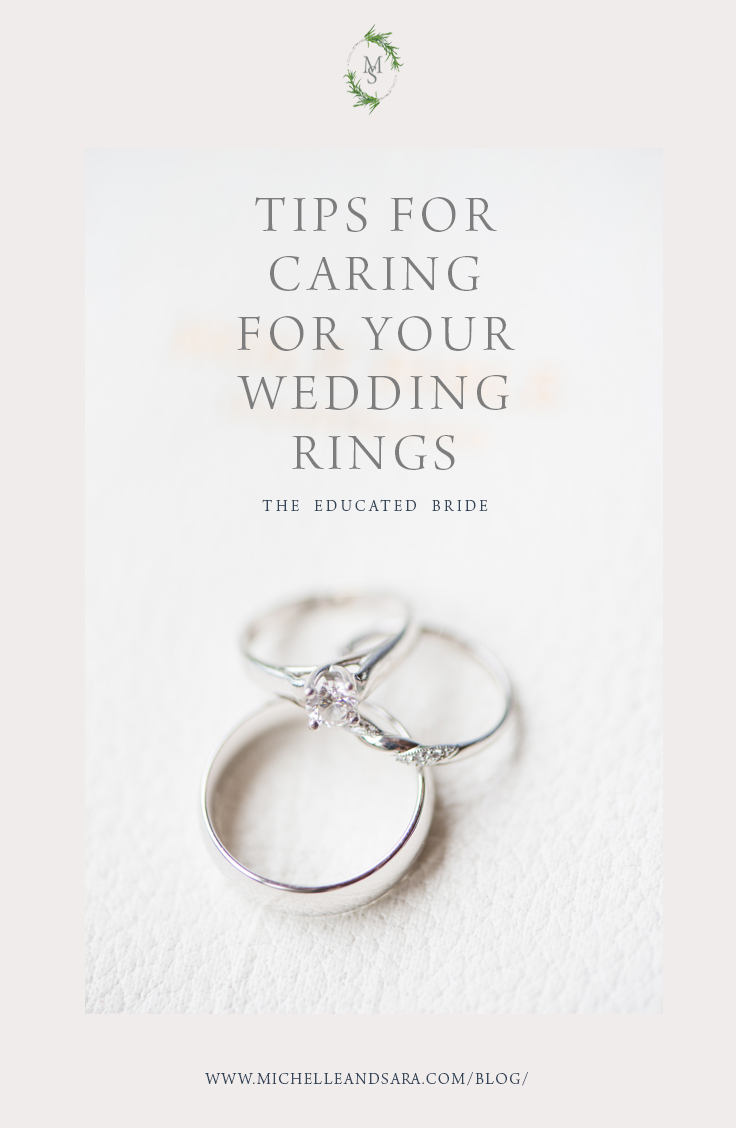 caring for your wedding rings blog post title photograph with three rings on white bible