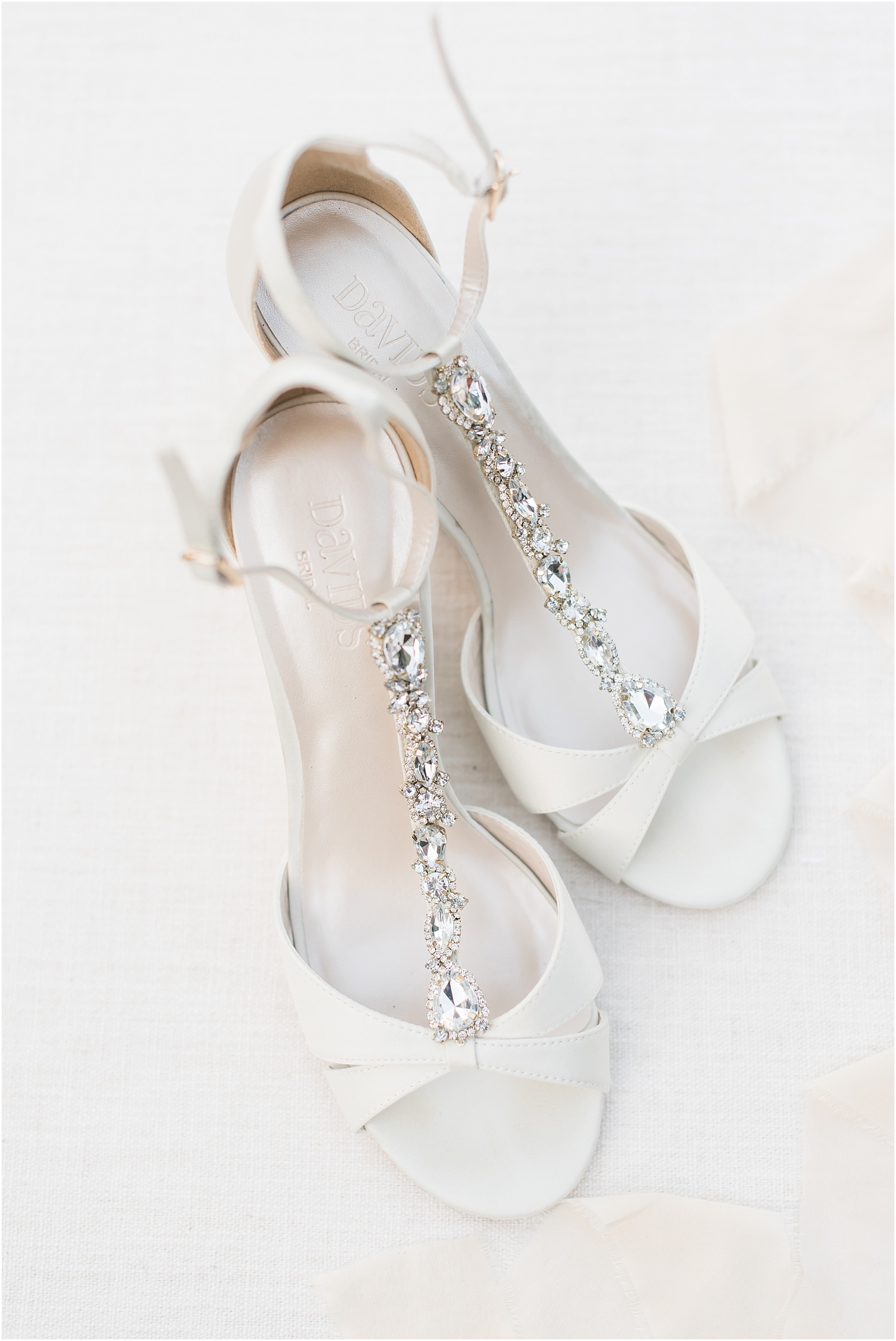 David's Bridal cream colored heals with sliver jewels on the straps
