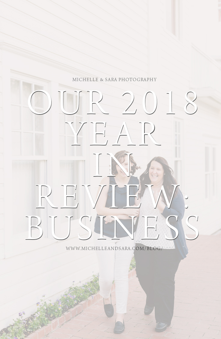 a mother and daughter walking arm in arm wearing navy blue, white and black in front of a white building with text overlay saying our business 2018 year in review